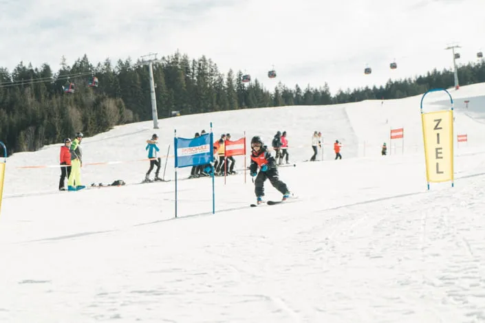 Skiers in the finish area of Kirchberg
